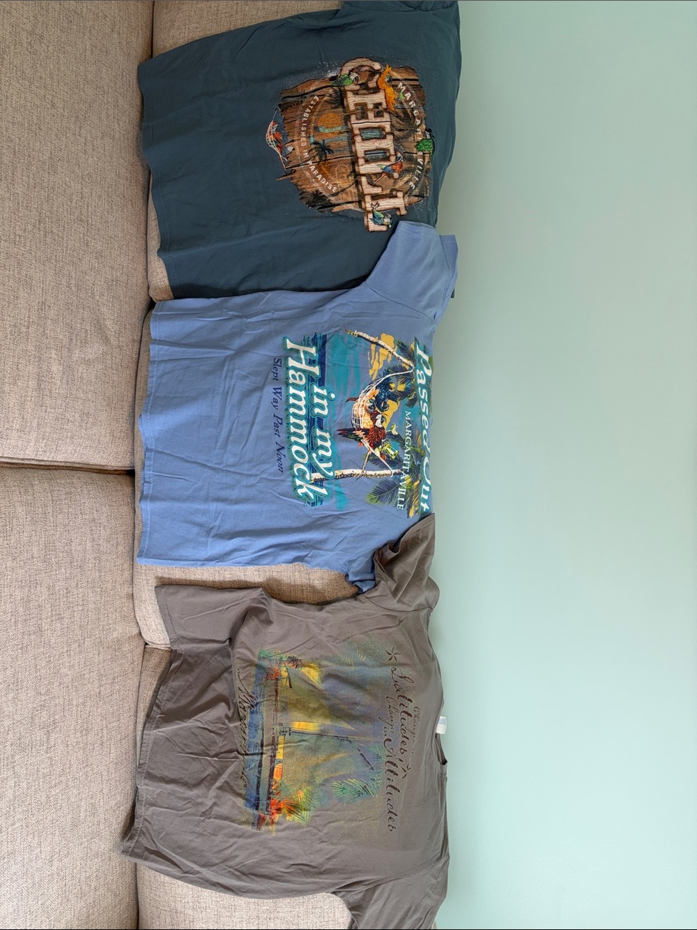 Three Margaritaville t-shirts.
